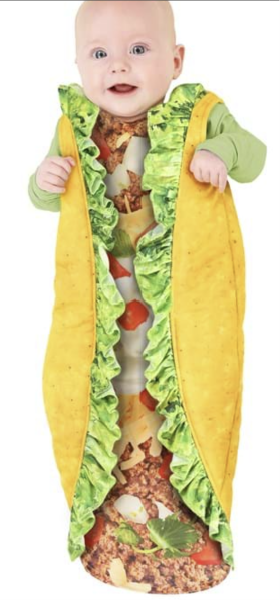 Baby in a taco swaddle with lettuce, meat and a yellow shell