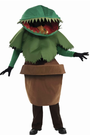 Person in a giant green Venus flytrap costume with a toothy mouth over the head and a brown pot skirt