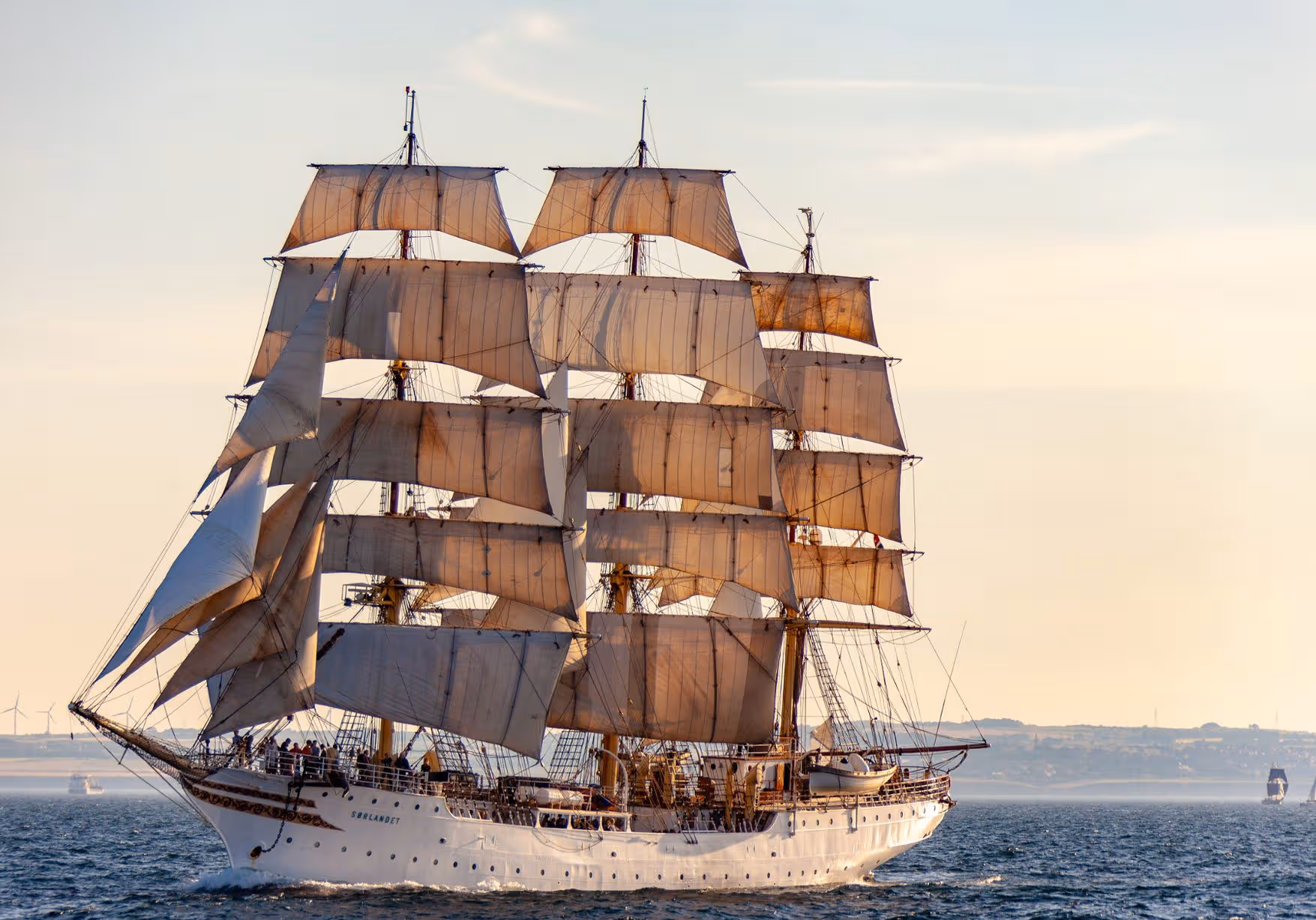 Tall ship under full sail at the Parade of Sail
