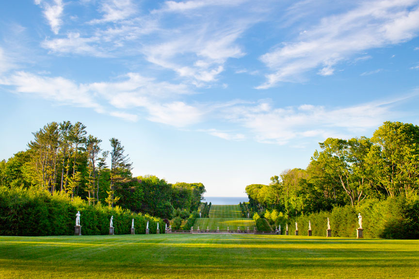 The Grand Allée at Castle Hill on the Crane Estate — a half-mile statue-lined lawn rolling down to the Atlantic Ocean in Ipswich, Massachusetts