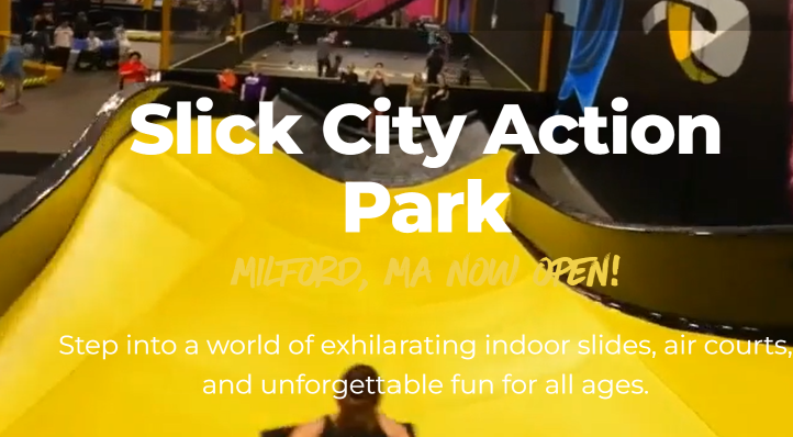 Slick City Action Park, Milford: a yellow indoor slide and trampoline courts